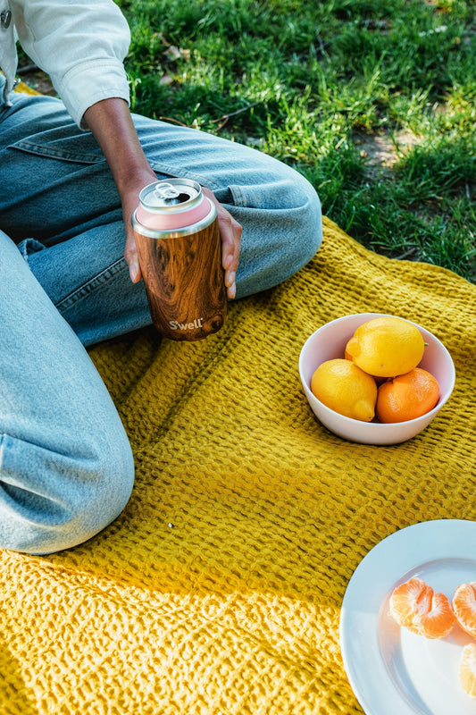 brown and white can on brown table mat